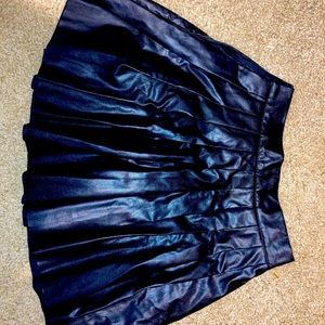 Never worn size small, SHEIN black leather ruffle skirt.